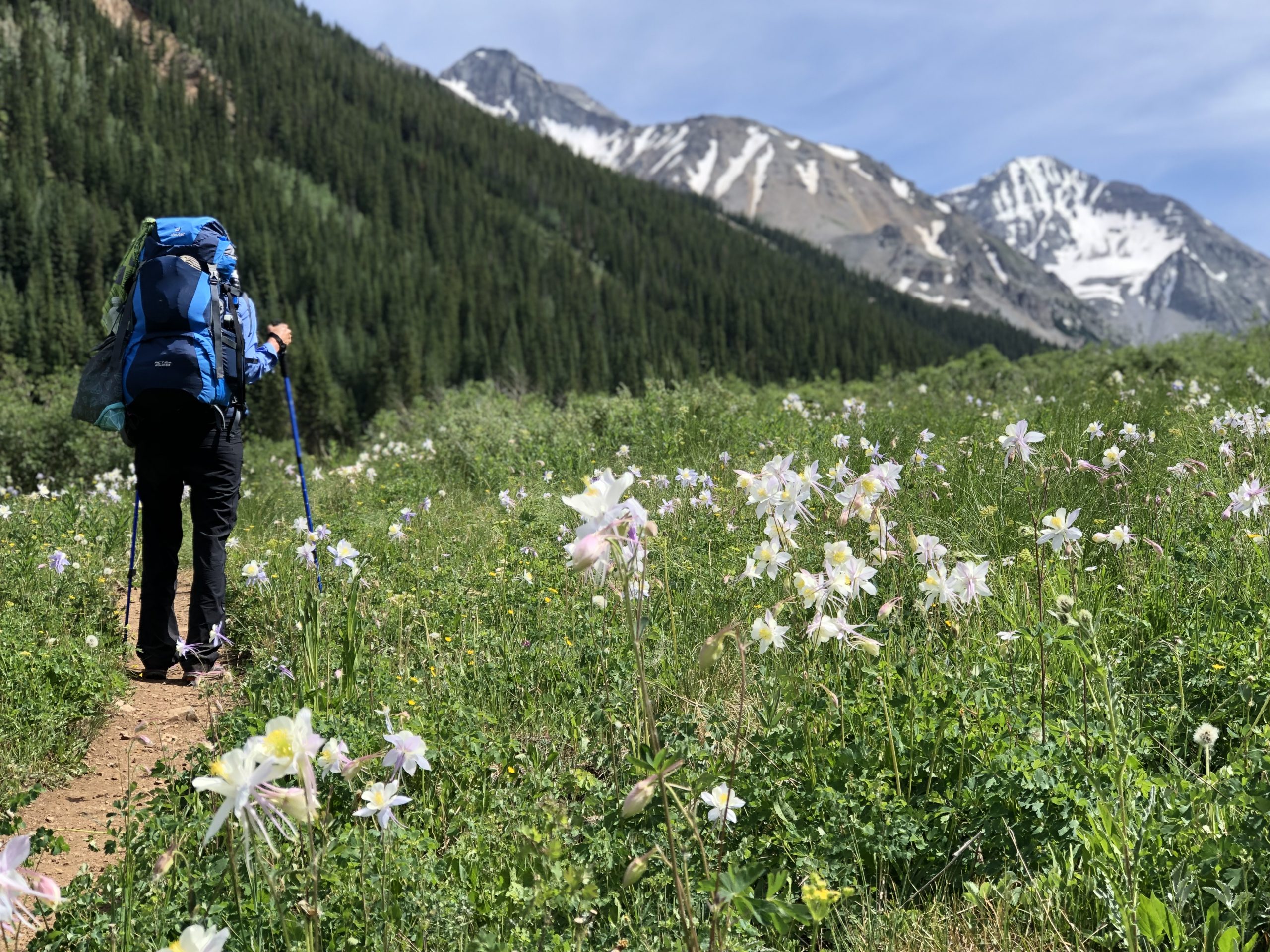 Showing backpack gear while hiking